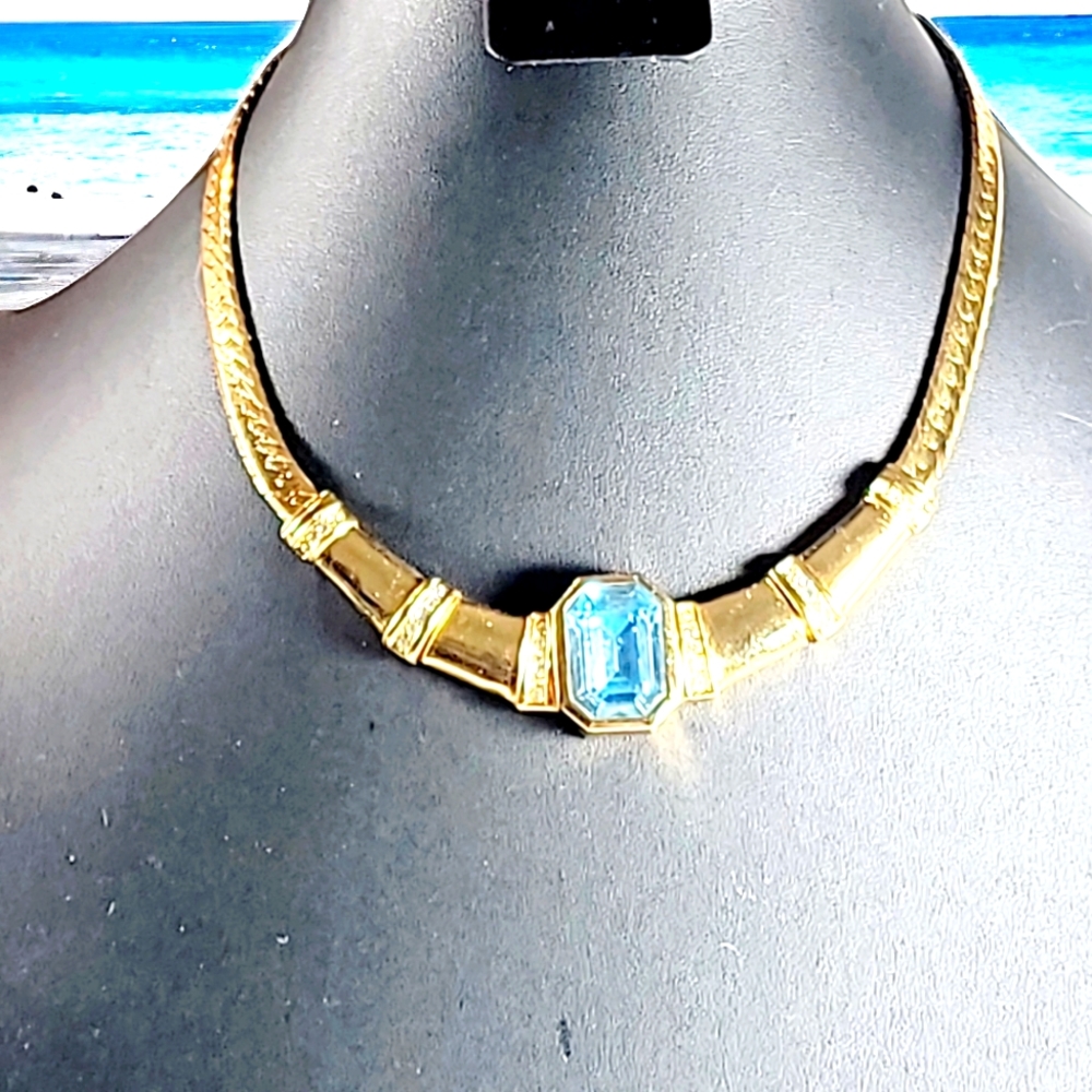 C. Dior Blue stone & Gold tone necklace